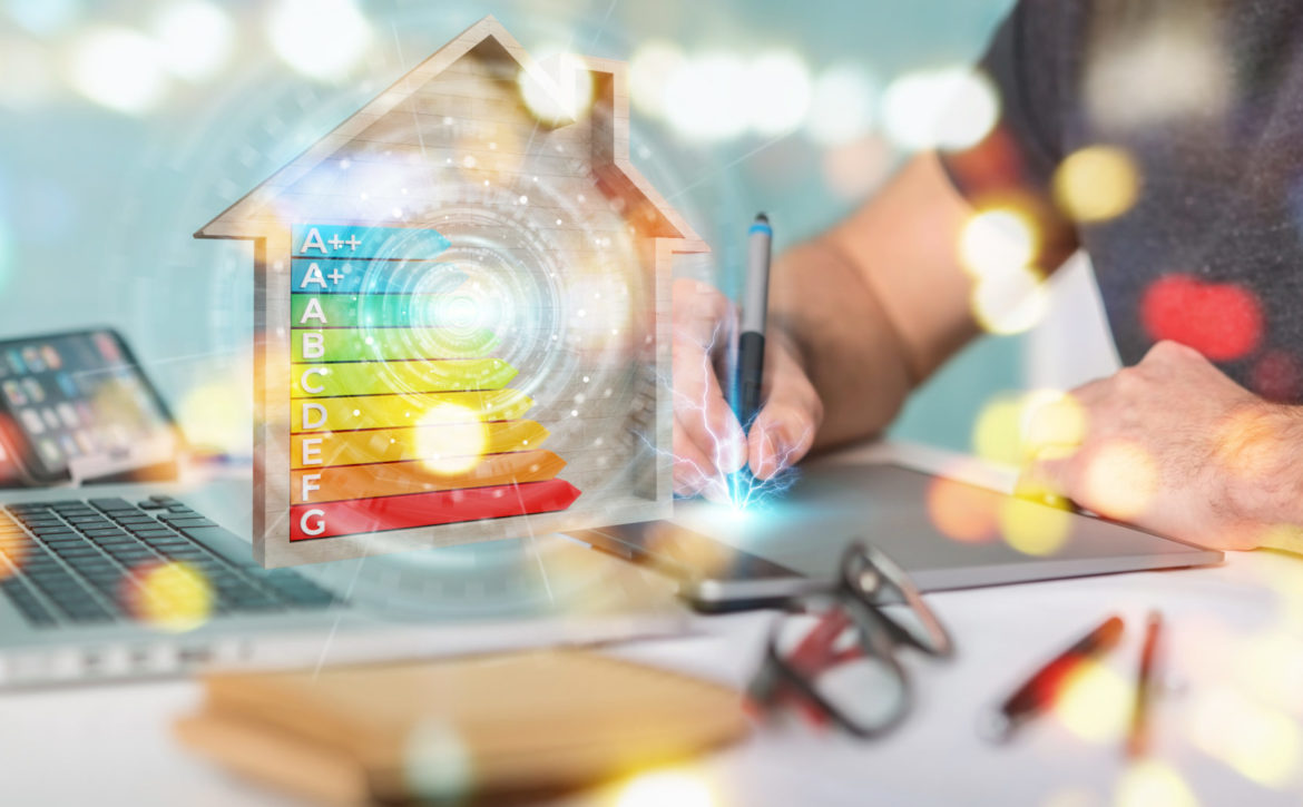 Graphic designer using 3D rendering energy rating chart in a wooden house